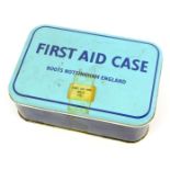 A vintage first aid kit, for Boots, Nottingham, in a blue case with partial contents.