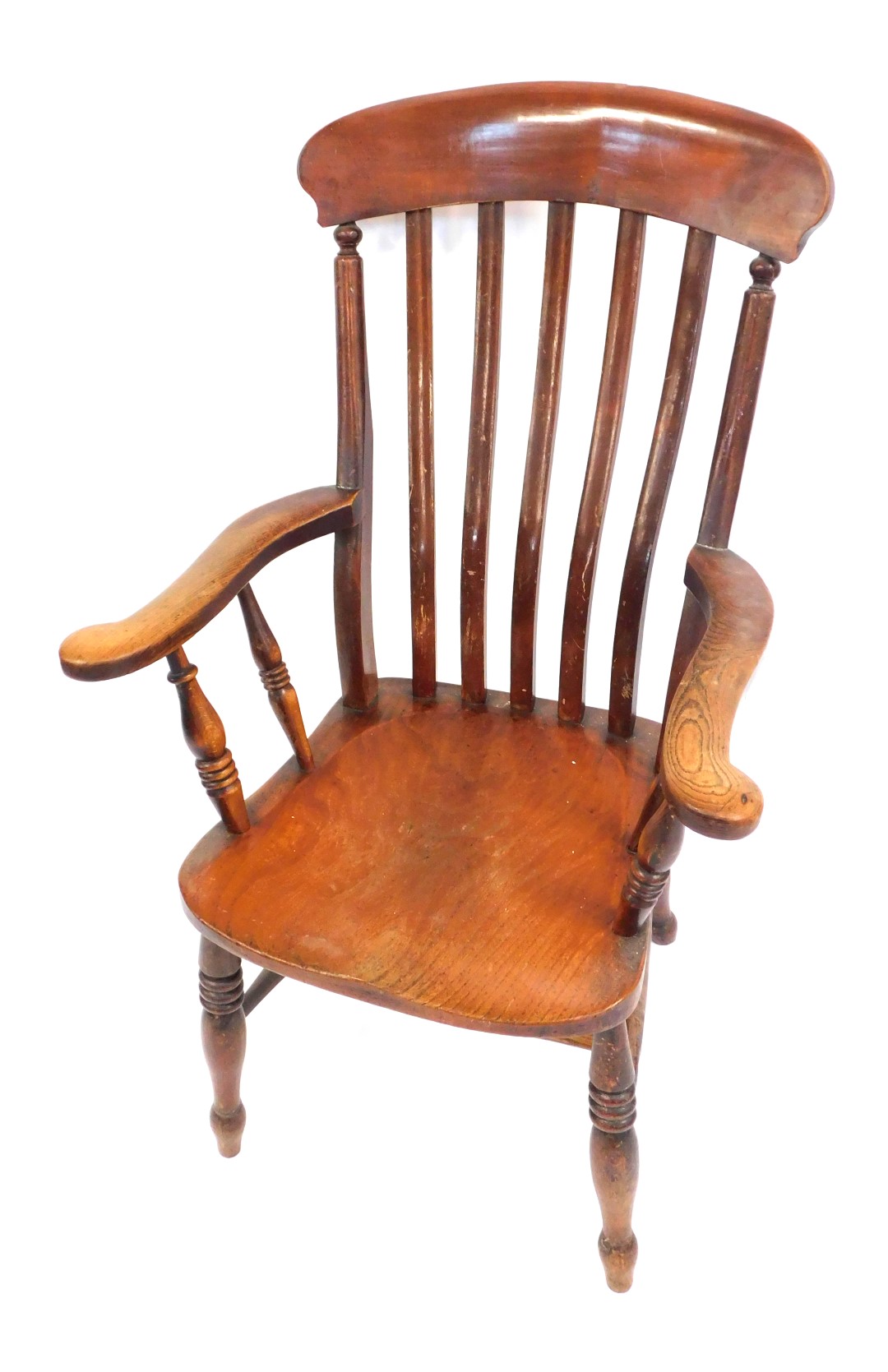 A Victorian elm and mahogany lath back kitchen chair, with solid saddle seat, raised on turned legs,