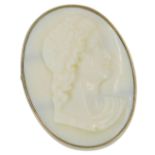 A cameo brooch, with oval cream cameo depicting maiden looking right with floral head dress, in yell