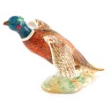 A Beswick pottery figure of a pheasant, number 850, printed and impressed marks.