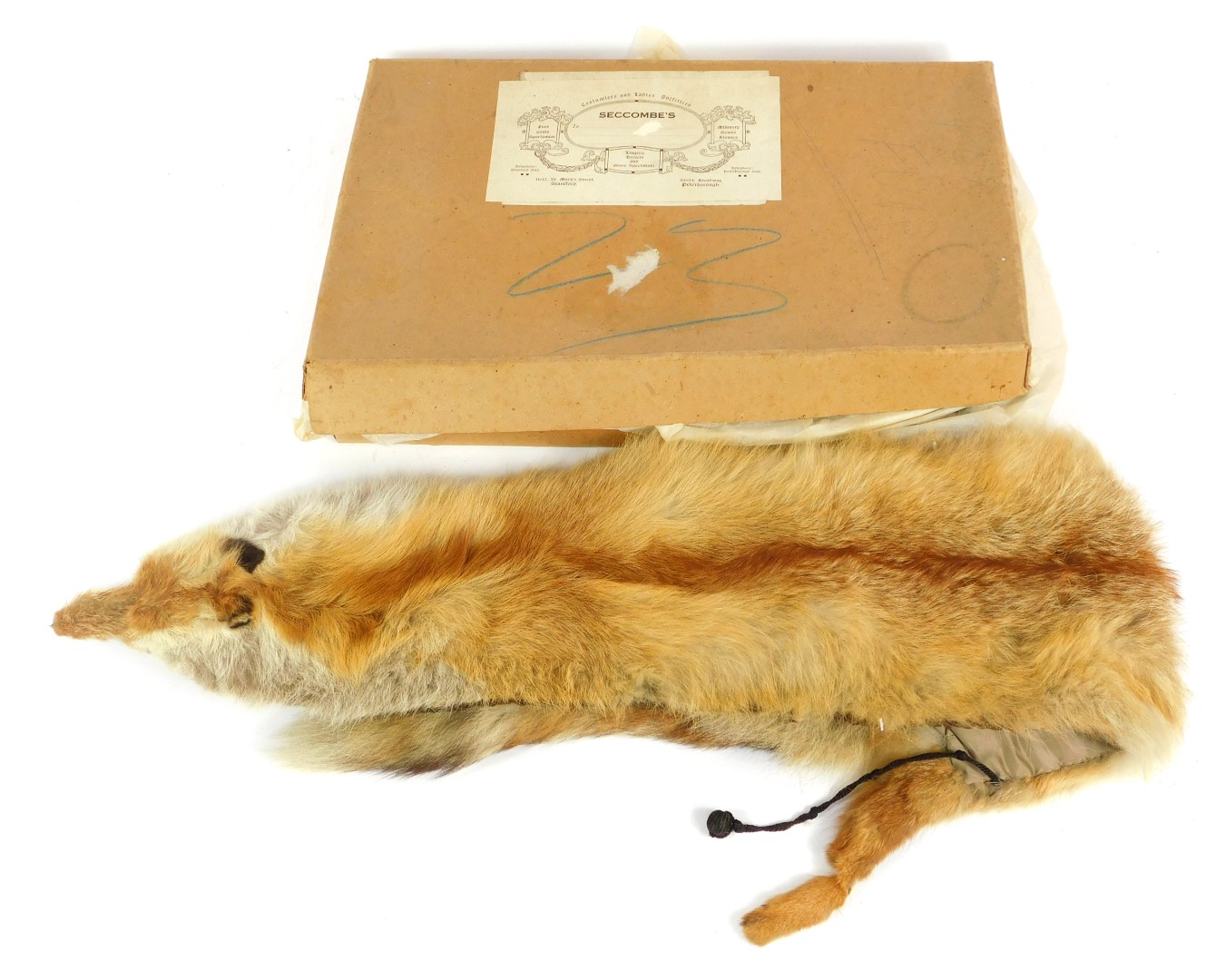 A fox fur stole, in a Seccombe's of Peterborough retailer's box.