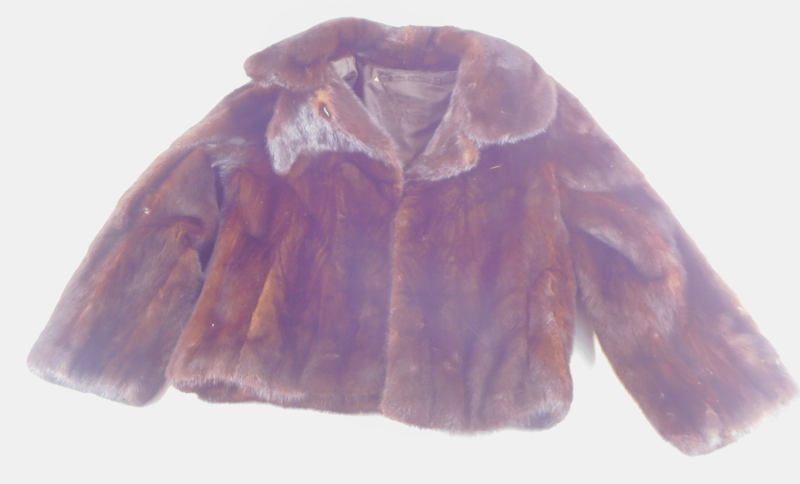 A National Fur Company 'Black Ebony' dark ranch mink ladies fur evening jacket. NB. The 1980 Insuran