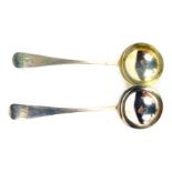 A pair of George V silver Old English pattern soup spoons, each bearing the monogram AER, London 192