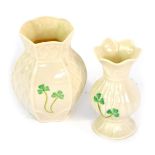 Two Belleek Shamrock pattern porcelain vases, Celebrating 150th Years, one with hexagonal rimmed top