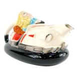 A Silver Crane Company novelty teapot modelled as a dodgem car, with lady driver, printed mark, 29cm