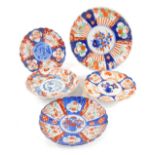 Five Chinese Imari dishes, variously decorated.