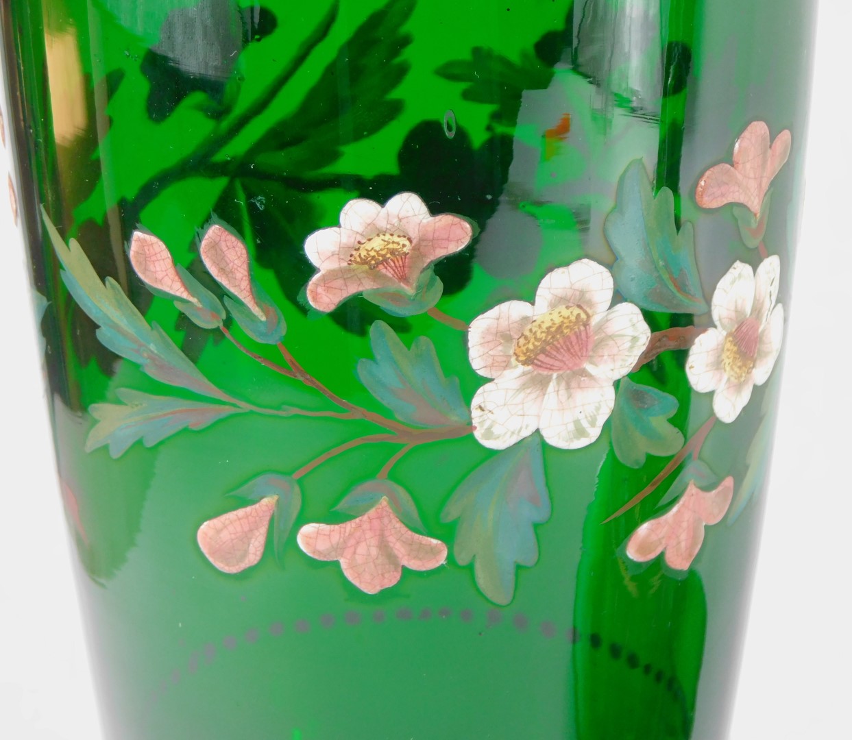 A group of late 19thC green glass, comprising a vase enamel decorated with wild roses, on a knopped - Image 2 of 2