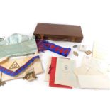 Masonic regalia, including two jewels, one in silver, aprons, sashes and printed ephemera, cased.