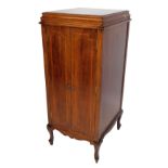 An Edwardian mahogany gramophone cabinet, lacking gramophone interior, with cross banding and a sha