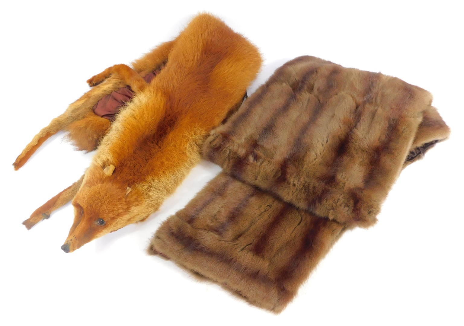 A brown mink stole, with silk lining, bearing the initials GRA, and a fox stole. (2)