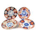 Four Chinese Imari dishes, variously decorated.