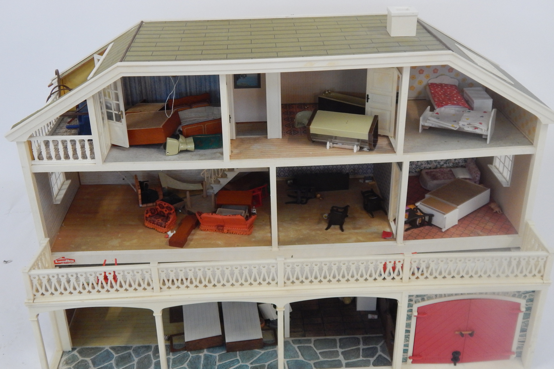 A Lundby doll's house, the house with a tiled roof, and glazed window panels with balcony and lower - Image 2 of 3