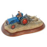 A Border Fine Arts Ridging Up Tractors figure group, A2141, 24cm wide, boxed.