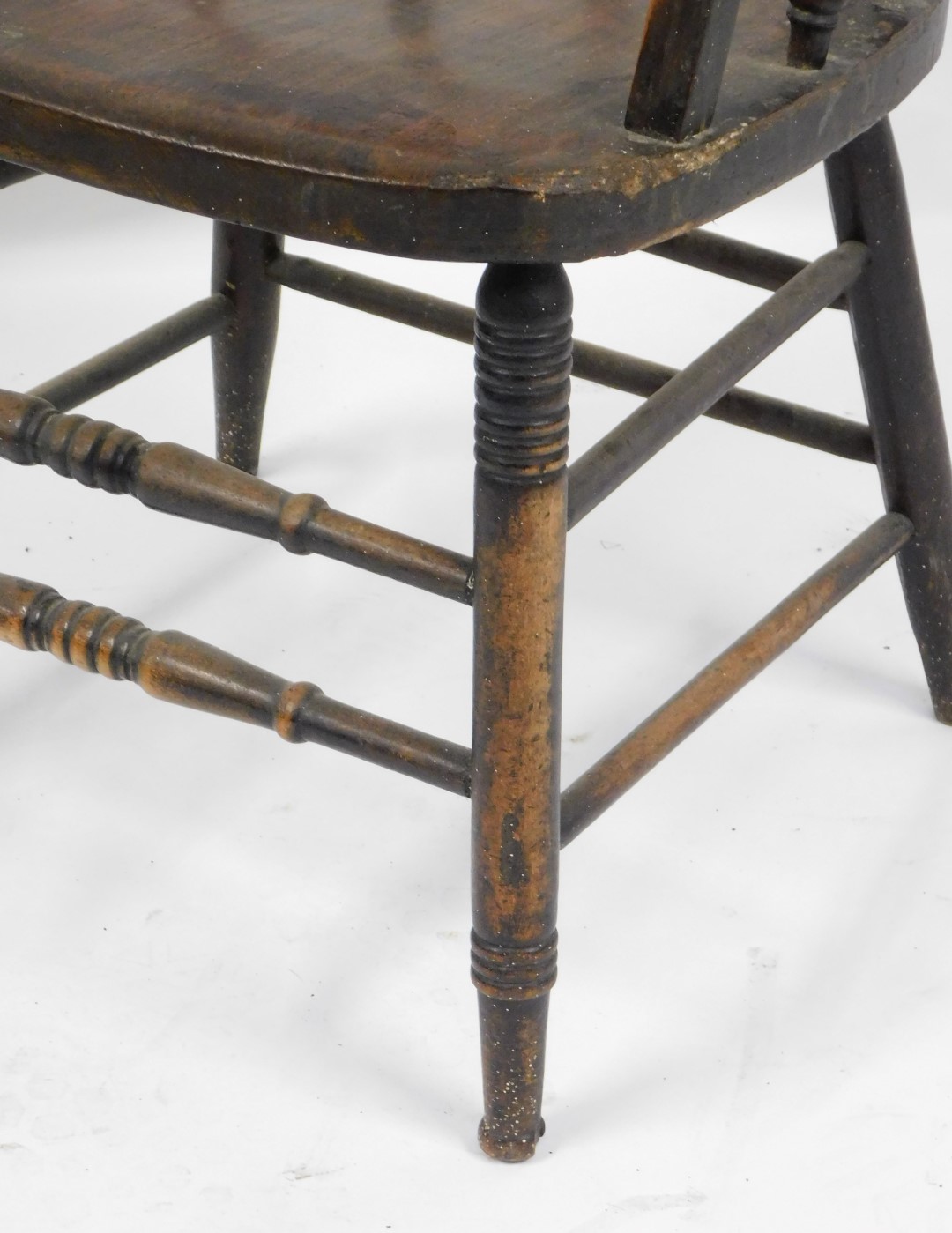 An early 20thC oak Captain's chair, with a carved floral back and shaped supports, on twin banded le - Image 3 of 3