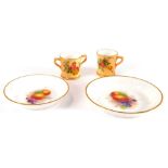 Two early 20thC Royal Worcester dishes, painted with fruit, unsigned, 10cm and 8.5cm wide, together