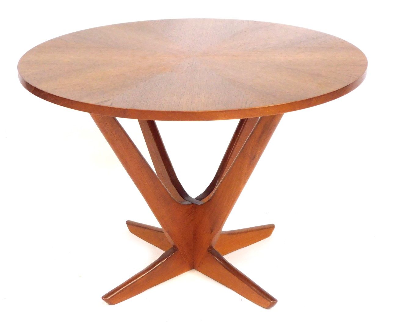 A Soren Georg Jensen Kubus radial teak Danish coffee table, with a sectional circular top, raised on