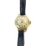 An Avia 9ct gold cased lady's wristwatch, with a silvered coloured dial and seconds dial, on a black