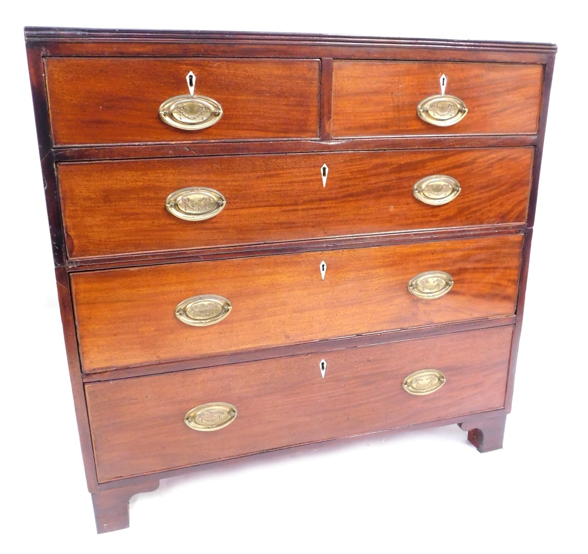 A late Georgian mahogany chest, of two short over three long drawers, with bone escutcheons and bras