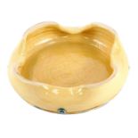 A Fenella Mallalieu studio pottery ash tray, with four point flared rim, applied green circular pain