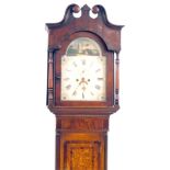 A 19thC mahogany longcase clock, with arched pediment top, and a painted dial with figures and windm