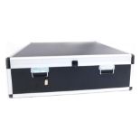 A black and aluminium storage case, 33cm high, 113cm wide, 107cm deep.