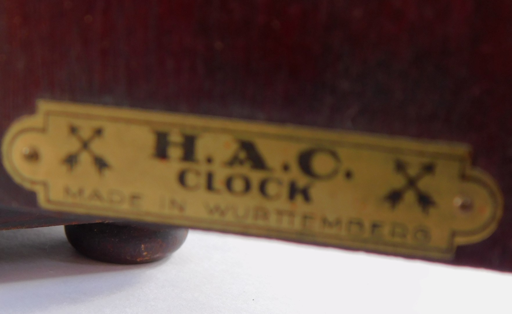 An early 20thC Hamburg American Clock Company mahogany cased mantel clock, circular silver dial bear - Image 3 of 3