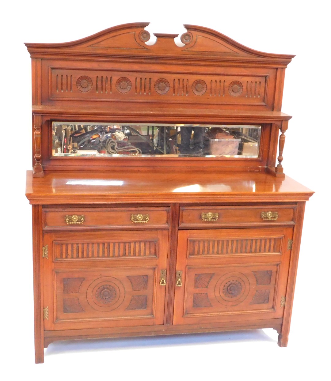 A Victorian walnut mirror back sideboard, on base with two drawers and two cupboard doors, on reeded