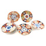 Five Chinese Imari dishes, variously decorated.