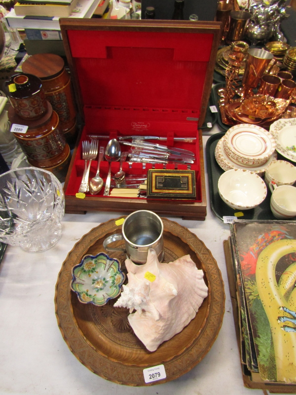 A cased canteen of Community cutlery, two wooden plates, conch shell, pewter tankard, glass pedestal