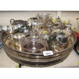 Two silver plated galleried trays, a wine coaster, pedestal bowl, part cruet, etc. (a quantity)