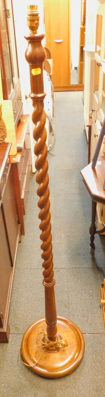 A mahogany barleytwist standard lamp.