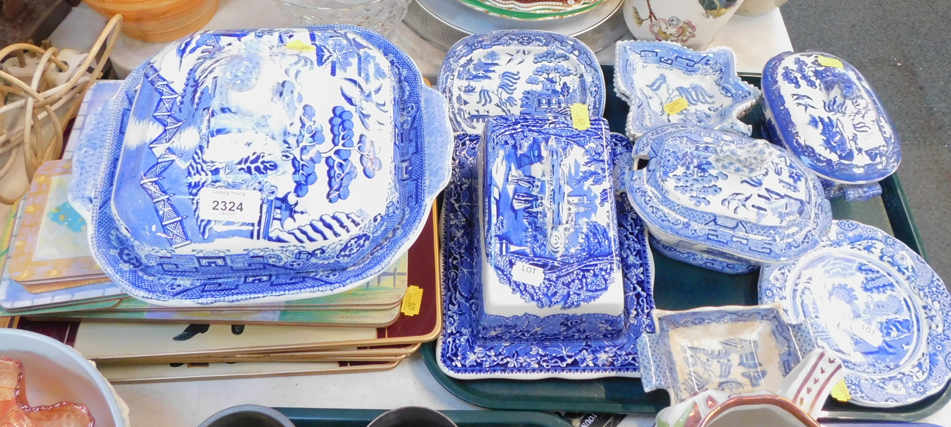Blue and white wares, comprising a pair of 19thC leaf moulded blue and white dishes, tureens and cov