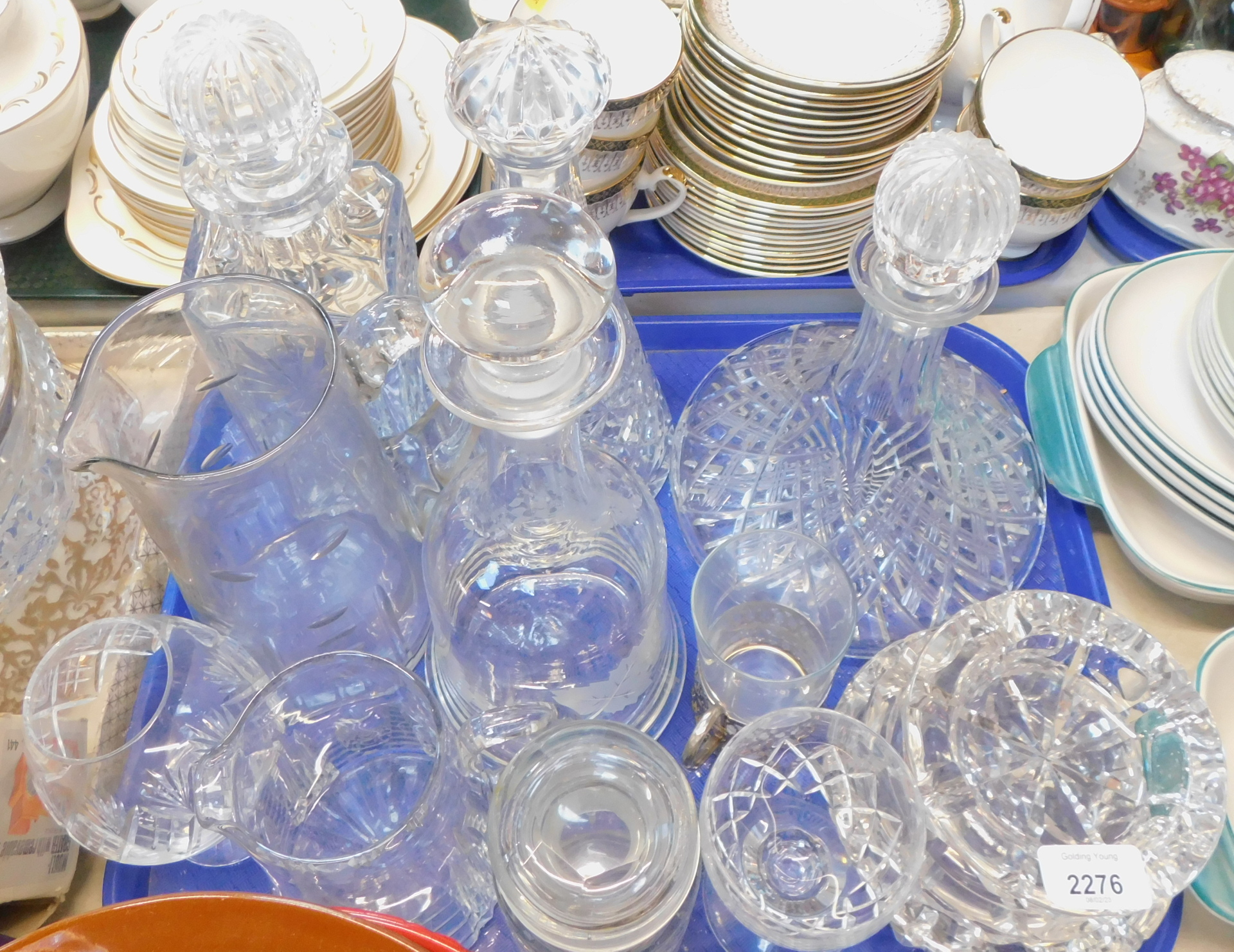 Decorative glassware, comprising four pressed glass decanters, three ashtrays, jugs, etc. (1 tray)