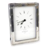 An Elizabeth II silver framed table clock, by Kitney and Co London, with stencilled 9cm wide back pl