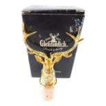 A boxed Glenfiddich stag head bottle stopper, 11cm high, boxed.