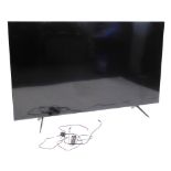 A Samsung 82" television, with power lead and remote.