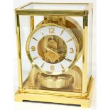 A 20thC Jaeger- LeCoultre VIII Atmos clock, with gilt metal movement, annular tension pendulum mecha