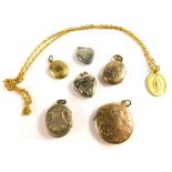 Various silver, gold plated and other lockets, to include one 4cm high, chased with scrolls, another