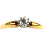 A diamond solitaire ring, with old cut diamond approx 0.10ct, in a claw platinum setting, on a yello