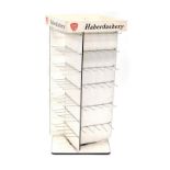 An Aero England haberdashery display stand, painted white with printed signage, 95cm high, 43cm wide