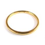 A 9ct gold wedding band, of plain design, ring size V, 1.9g all in.
