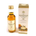 A miniature bottle of the Macallan single Highland malt Scotch whisky ten year old, 50ml, in outer c