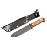 A British Army survival knife 1993, serial number 127 8214, JA 1993/1, with sheath, 33cm wide.