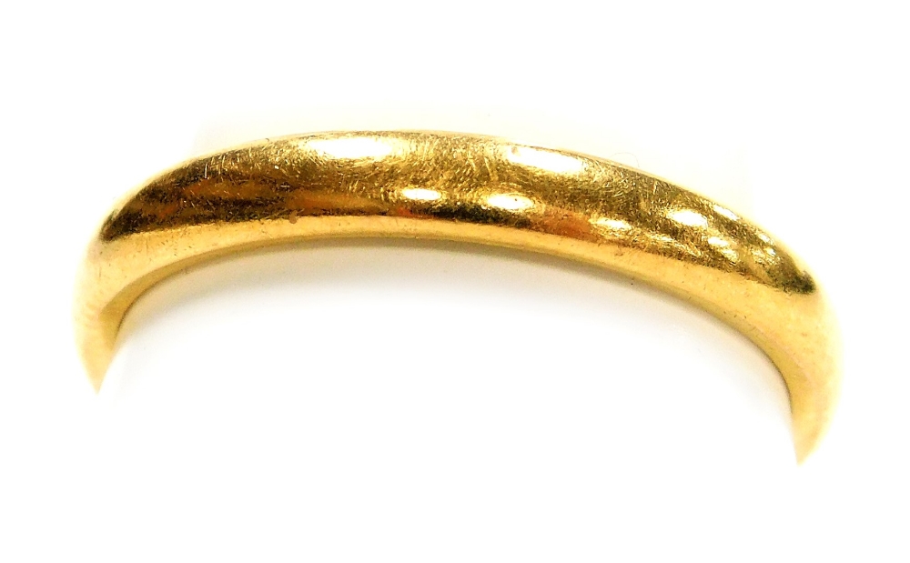 A 22ct gold wedding band, size S, 4.9g.