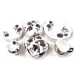 A Royal Albert porcelain Masquerade pattern tea service, comprising three bread plates, cream jug an
