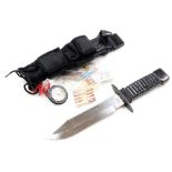 A Taiwanese survival knife, with a steel blade, in a sheath with belt attachment, 34cm wide.