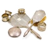 A group of small silver, comprising a George V silver mounted hairbrush and hand mirror, Birmingham