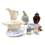 A group of porcelain, to include a Royal Worcester cream porcelain jug, of moulded leaf form, printe