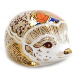 A Royal Crown Derby porcelain Hawthorn Hedgehog paperweight, red printed marks and gold stopper, 10c
