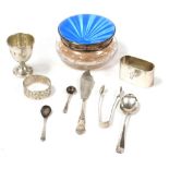 A group of small silver, to include a cut glass dressing table bottle with a silver and blue guilloc
